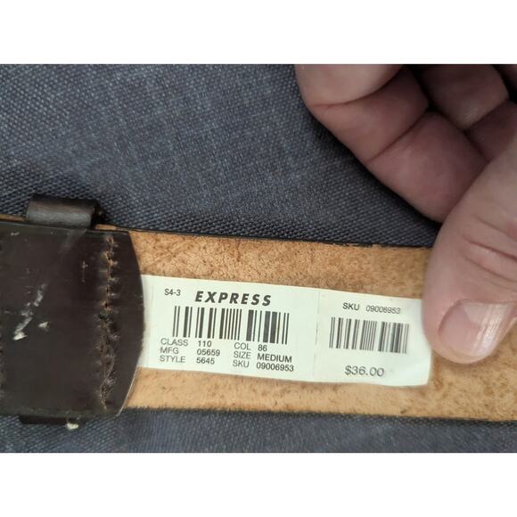 Women\'s light tan tooled leather belt w/silver hardware by Express size M (34\